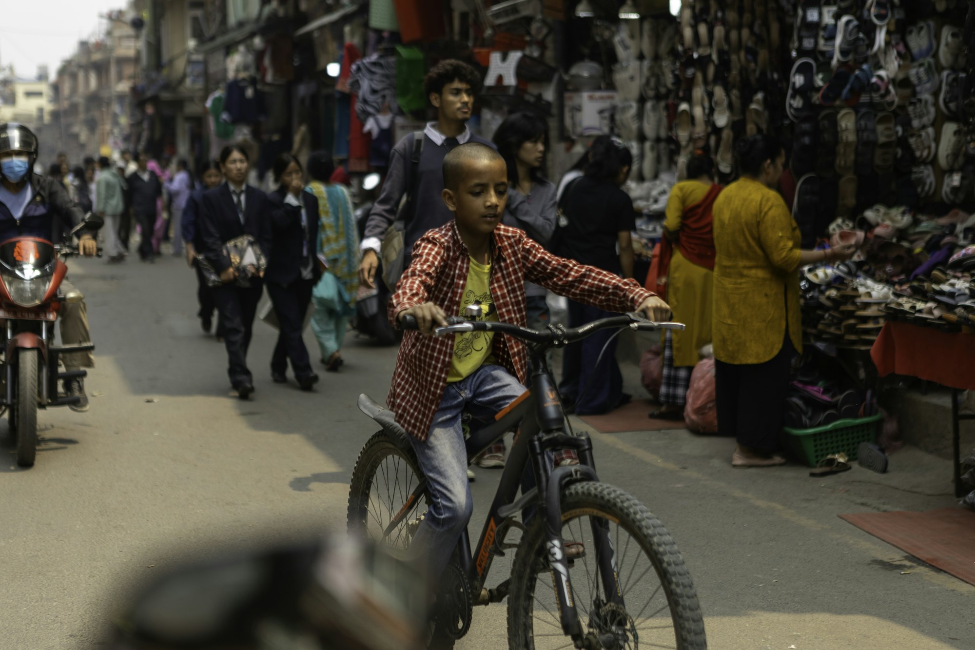 Motorbikes and traffic in a Kathmandu street