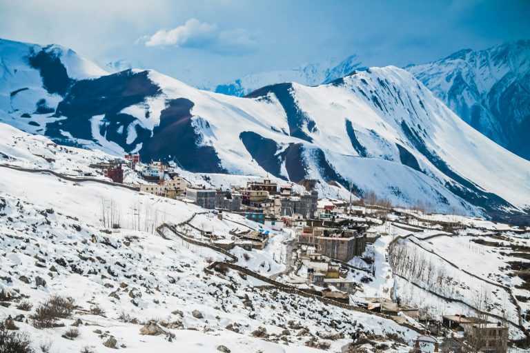 Snow-covered houses in Mustang in winter